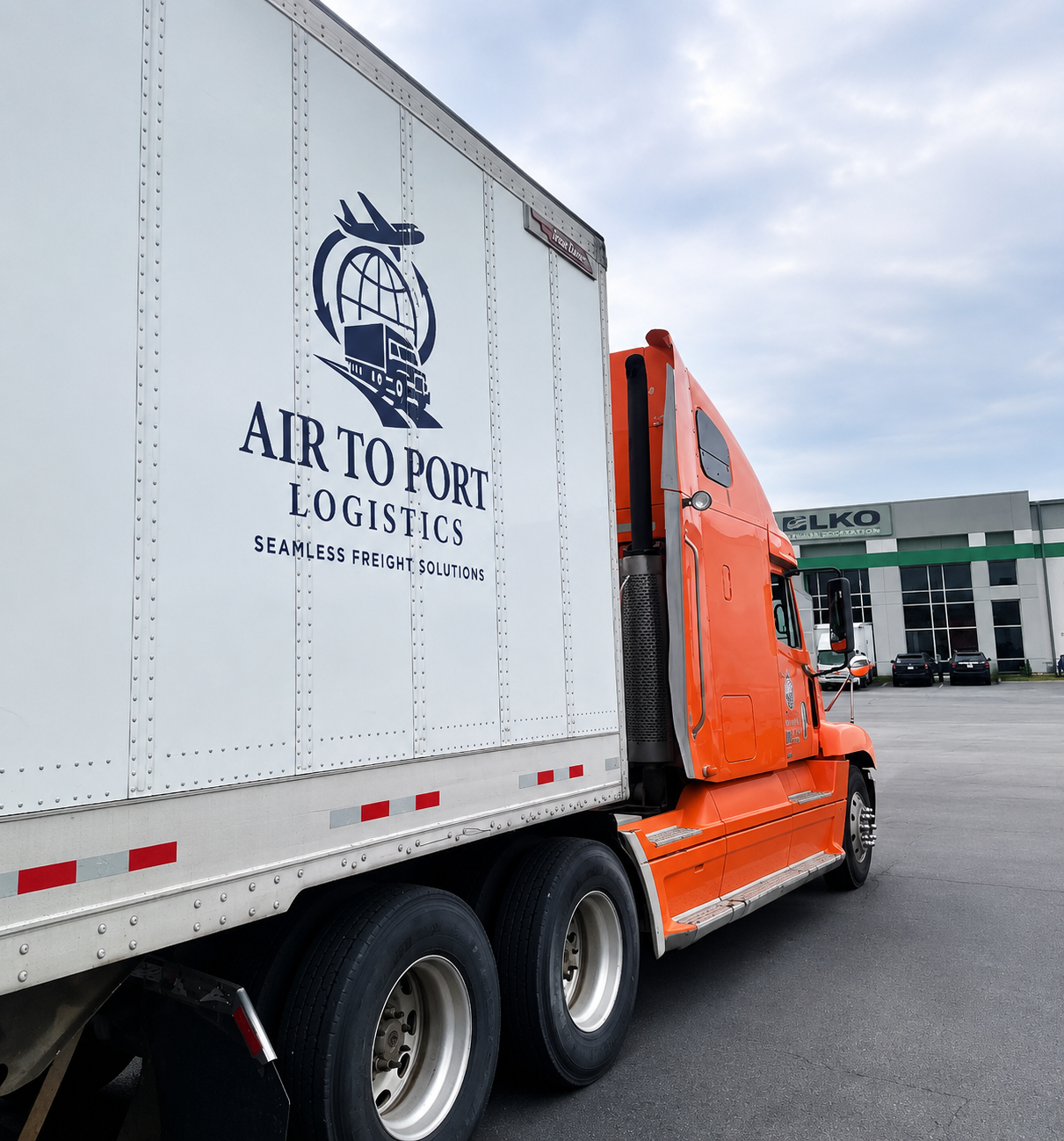 Air to Port Logistics — Cross-border trucking US/Canada Air to Port Logistics dry van trailer with company branding — US-Canada cross-border freight